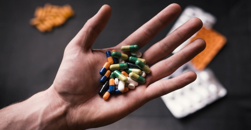 Psychiatric Drugs in a persons hand