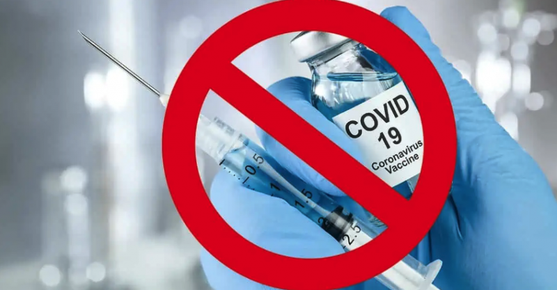 covid vaccine vial and shot with red strike over them