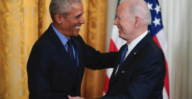 Biden and Obama shaking hands