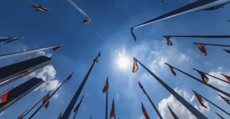 Image of looking up at flags to depict Western Civilization
